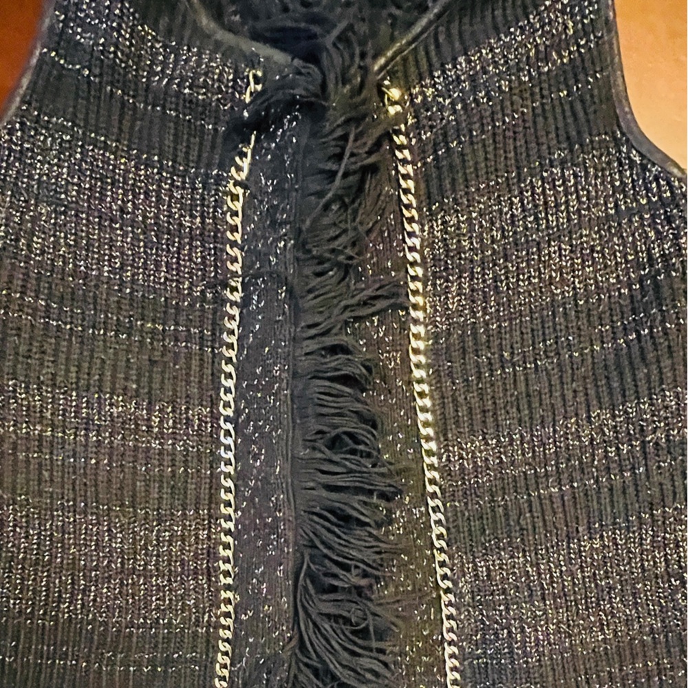 Vest by Jessica Simpson
All sales final. Open to offe